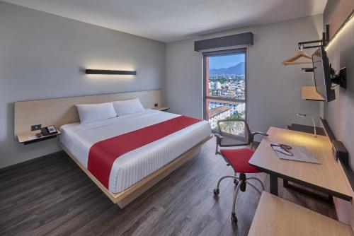Imagen de la habitación del Hotel City Express Plus Puerto Vallarta. Foto 6