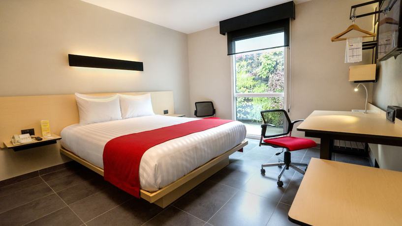 Imagen de la habitación del Hotel City Express Plus by Marriott Cali Colombia. Foto 8