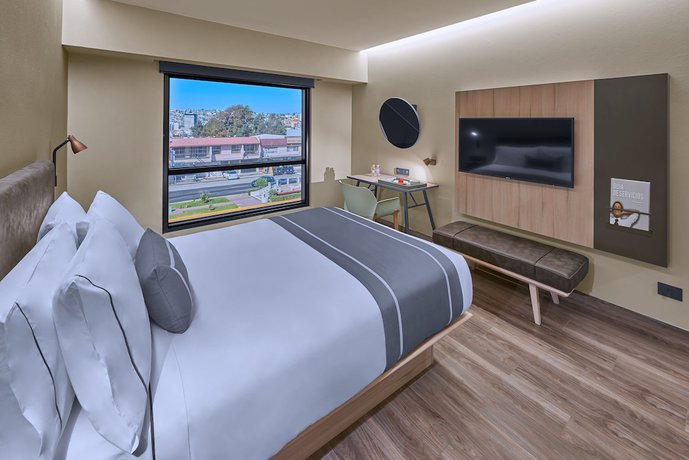 Imagen de la habitación del Hotel City Express Plus by Marriott Guadalajara Providencia. Foto 5