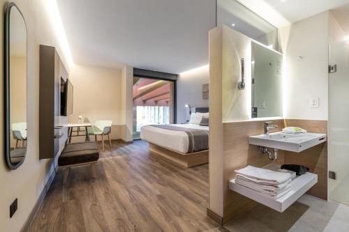 Imagen de la habitación del Hotel City Express Plus by Marriott Monterrey Centro. Foto 9