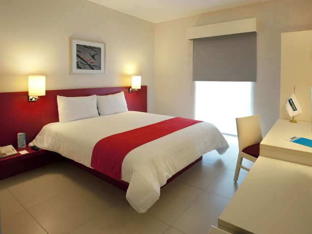 Imagen de la habitación del Hotel City Express Poza Rica. Foto 12