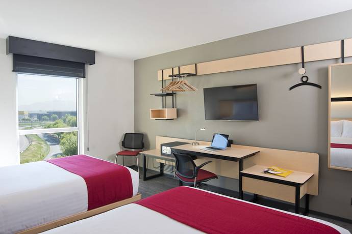 Imagen de la habitación del Hotel City Express Santiago Aeropuerto. Foto 9