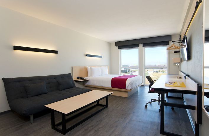 Imagen de la habitación del Hotel City Express Santiago Aeropuerto. Foto 11