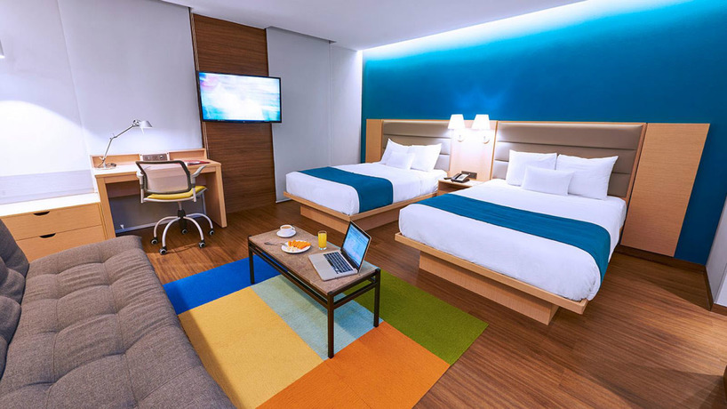 Imagen de la habitación del Hotel City Express Suites By Marriott Playa Del Carmen. Foto 6