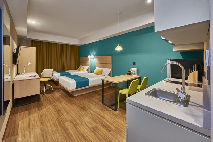 Imagen de la habitación del Hotel City Express Suites By Marriott Tijuana Rio. Foto 10