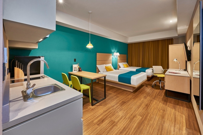 Imagen de la habitación del Hotel City Express Suites By Marriott Tijuana Rio. Foto 11