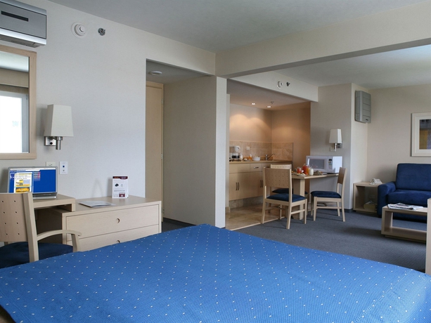 Imagen de la habitación del Hotel City Express Suites by Marriott Queretaro. Foto 4