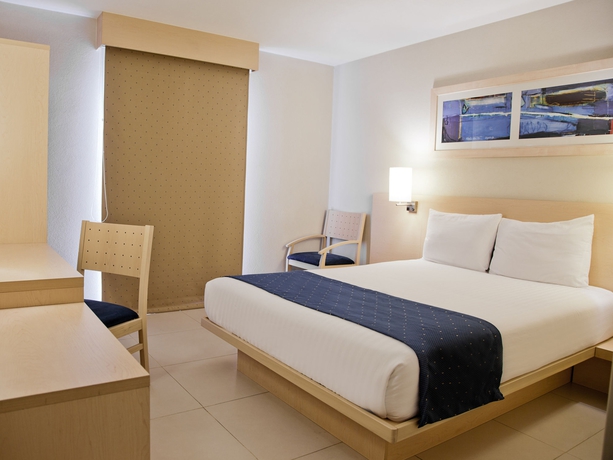 Imagen de la habitación del Hotel City Express Villahermosa. Foto 11