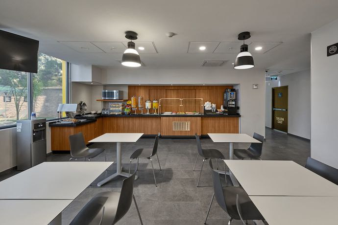 Imagen del bar/restaurante del Hotel City Express by Marriott Hermosillo Expo. Foto 2