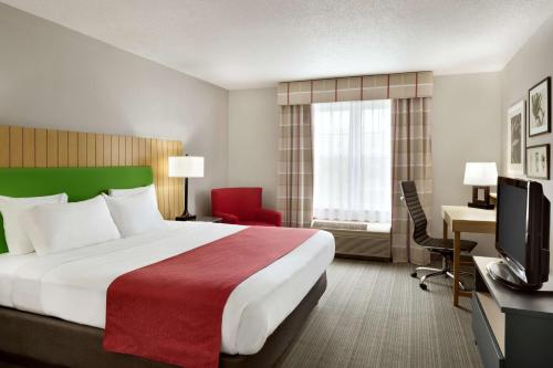 Imagen de la habitación del Hotel City Express by Marriott Louisville Southeast. Foto 18