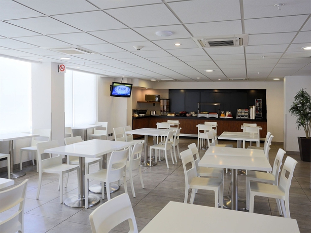Imagen del bar/restaurante del Hotel City Express by Marriott Tijuana Insurgentes. Foto 1