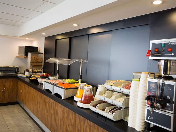 Imagen del bar/restaurante del Hotel City Express by Marriott Tijuana Insurgentes. Foto 4
