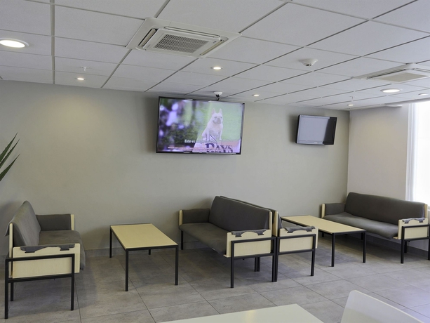 Imagen de los interiores del Hotel City Express by Marriott Tijuana Insurgentes. Foto 9