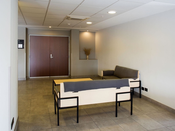 Imagen de los interiores del Hotel City Express by Marriott Tijuana Insurgentes. Foto 10