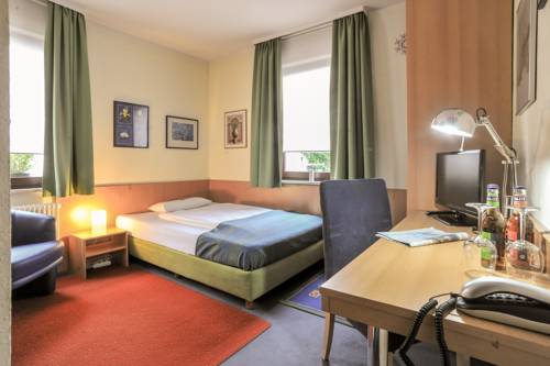 Imagen de la habitación del Hotel City Fellbach. Foto 6