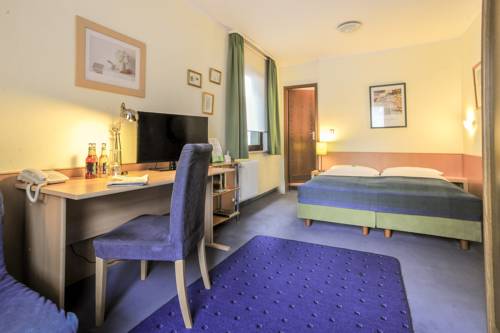 Imagen de la habitación del Hotel City Fellbach. Foto 8