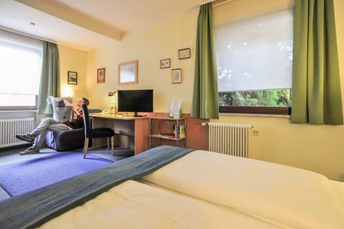 Imagen de la habitación del Hotel City Fellbach. Foto 9