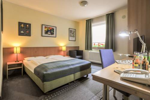 Imagen de la habitación del Hotel City Fellbach. Foto 10