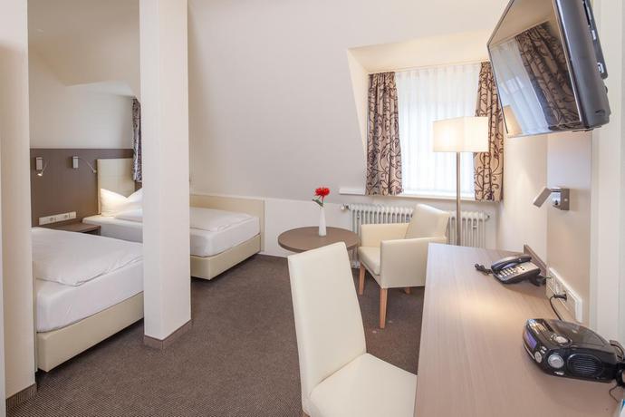 Imagen de la habitación del Hotel City Freiburg. Foto 5