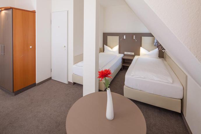 Imagen de la habitación del Hotel City Freiburg. Foto 6