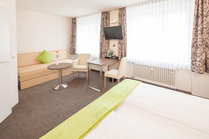 Imagen de la habitación del Hotel City Freiburg. Foto 11