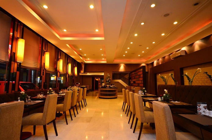 Imagen del bar/restaurante del Hotel City Garden Suites Manila. Foto 1