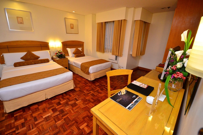 Imagen de la habitación del Hotel City Garden Suites Manila. Foto 7
