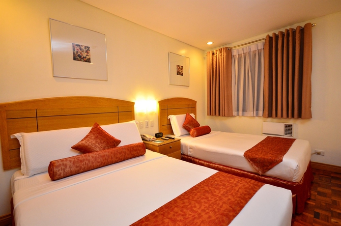 Imagen de la habitación del Hotel City Garden Suites Manila. Foto 8