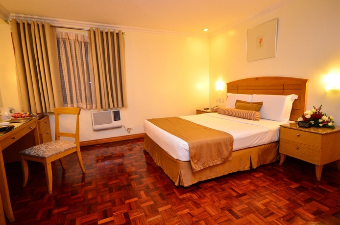 Imagen de la habitación del Hotel City Garden Suites Manila. Foto 9