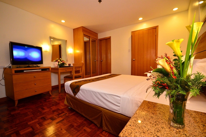 Imagen de la habitación del Hotel City Garden Suites Manila. Foto 10