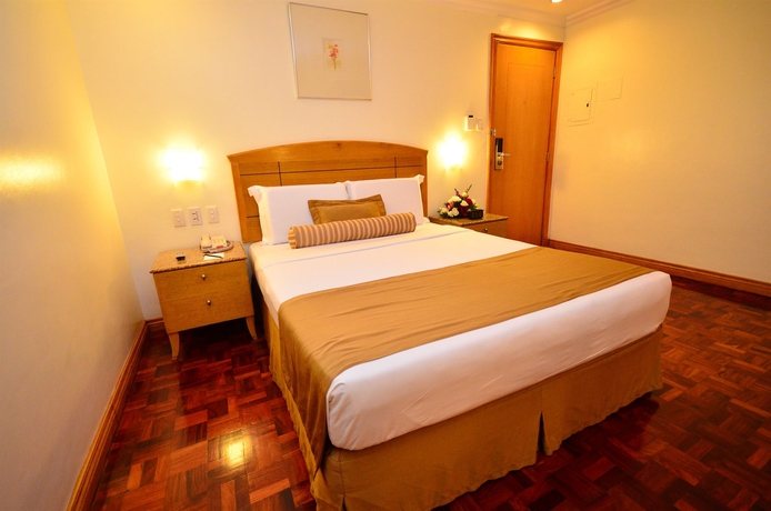Imagen de la habitación del Hotel City Garden Suites Manila. Foto 13