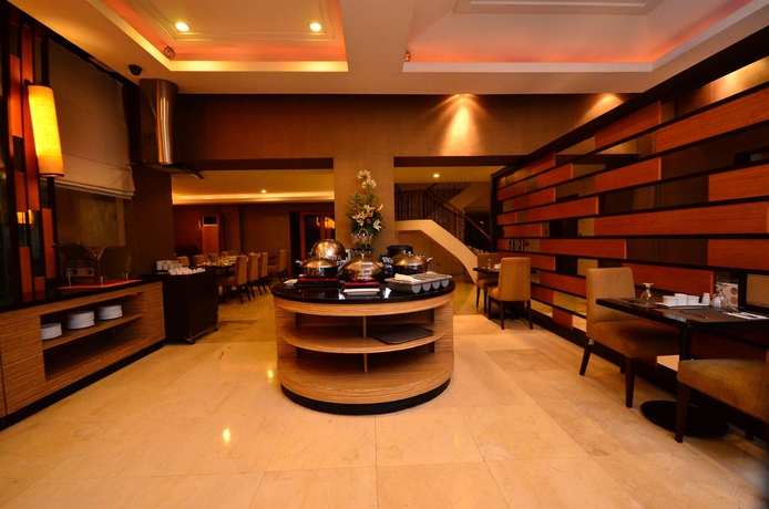 Imagen del bar/restaurante del Hotel City Garden Suites Manila. Foto 3