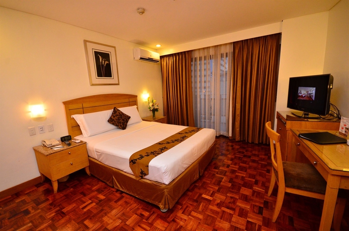 Imagen de la habitación del Hotel City Garden Suites Manila. Foto 15
