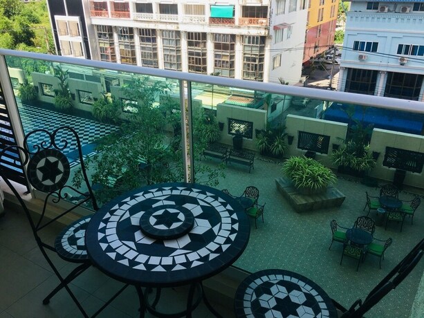 Imagen de la habitación del Hotel City Garden Tower. Foto 10