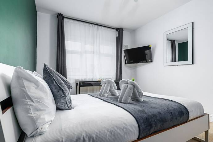 Imagen de la habitación del Hotel City Gate Guest House. Foto 9