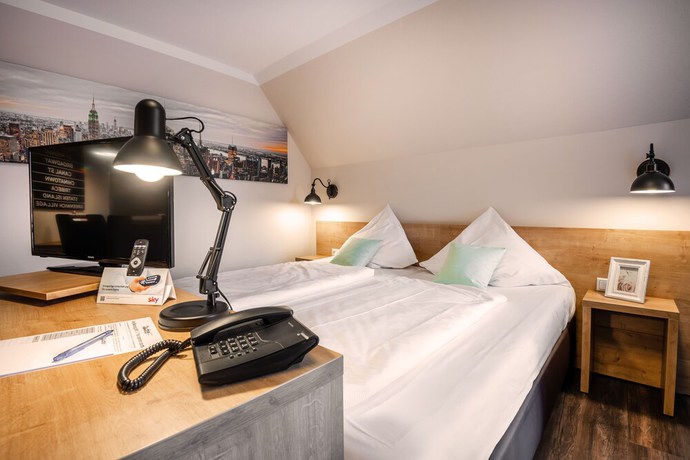 Imagen de la habitación del Hotel City, Geilenkirchen. Foto 17