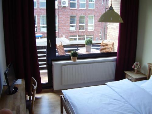 Imagen de la habitación del Hotel City Gifhorn. Foto 7