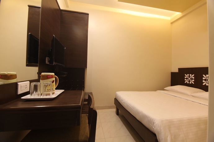 Imagen de la habitación del Hotel City Guest House, Mumbai. Foto 1