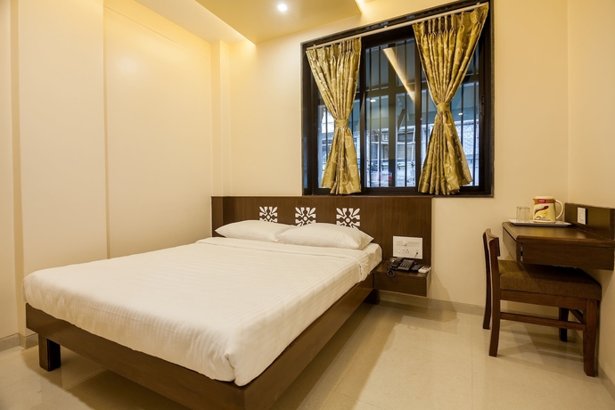 Imagen de la habitación del Hotel City Guest House, Mumbai. Foto 2