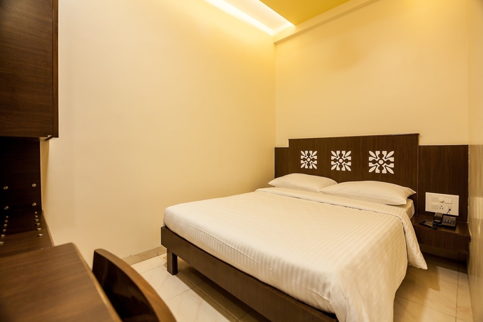 Imagen de la habitación del Hotel City Guest House, Mumbai. Foto 4