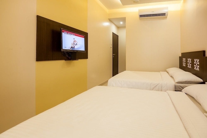 Imagen de la habitación del Hotel City Guest House, Mumbai. Foto 6