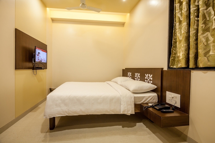 Imagen de la habitación del Hotel City Guest House, Mumbai. Foto 7