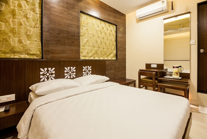 Imagen de la habitación del Hotel City Guest House, Mumbai. Foto 8