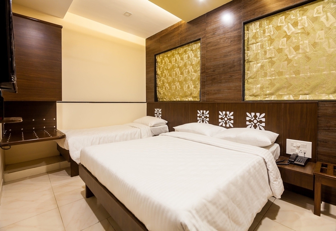 Imagen de la habitación del Hotel City Guest House, Mumbai. Foto 12