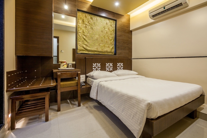 Imagen de la habitación del Hotel City Guest House, Mumbai. Foto 13