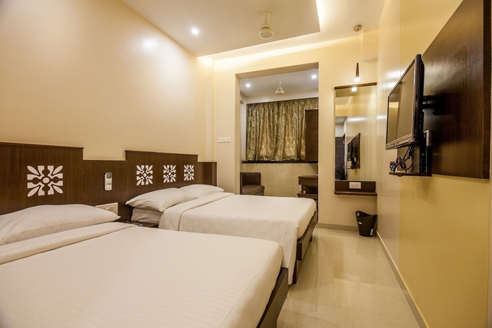 Imagen de la habitación del Hotel City Guest House, Mumbai. Foto 14