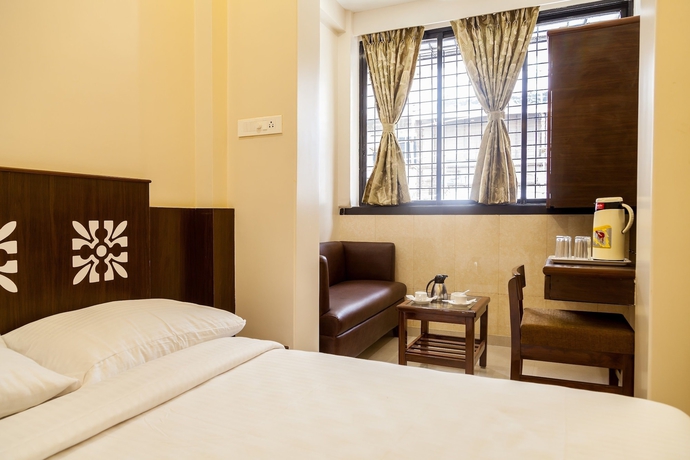 Imagen de la habitación del Hotel City Guest House, Mumbai. Foto 16