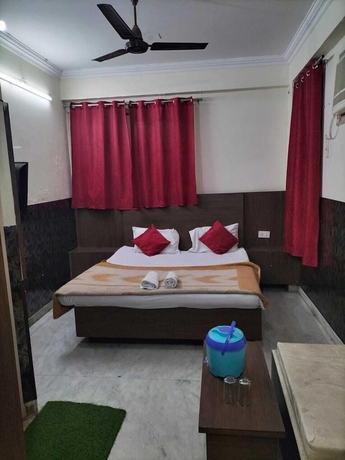 Imagen de la habitación del Hotel City Heart, Haridwar. Foto 5