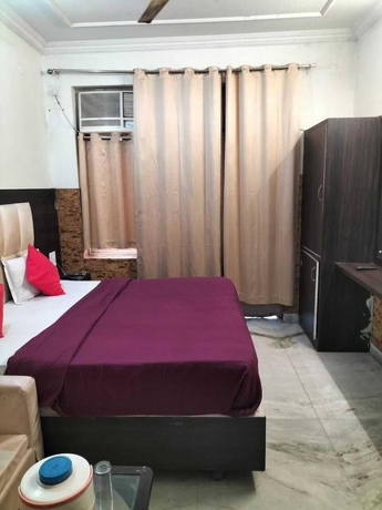 Imagen de la habitación del Hotel City Heart, Haridwar. Foto 7
