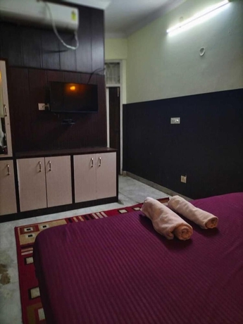 Imagen de la habitación del Hotel City Heart, Haridwar. Foto 9